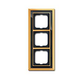 Рамка для розеток и выключателей 3 поста Династия, латунь полированная, черное стекло (1754-0-4567) 2CKA001754A4567 ABB